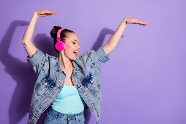 Portrait of nice positive girl listening pop hit sound having fun dancing