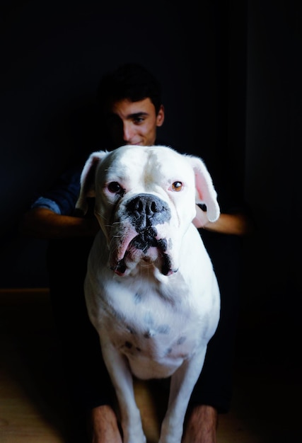 写真 犬と男の肖像画