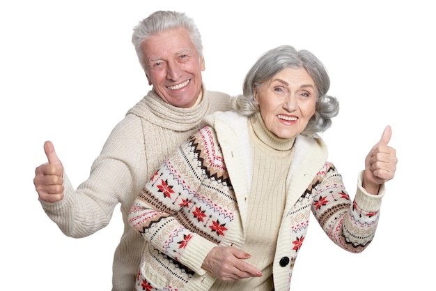 Фото Портрет пожилой пары с поднятыми большими пальцами
