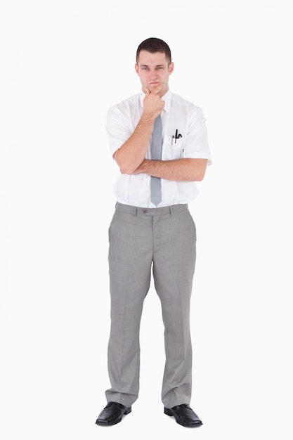 Portrait of an office worker with the hand on his chin