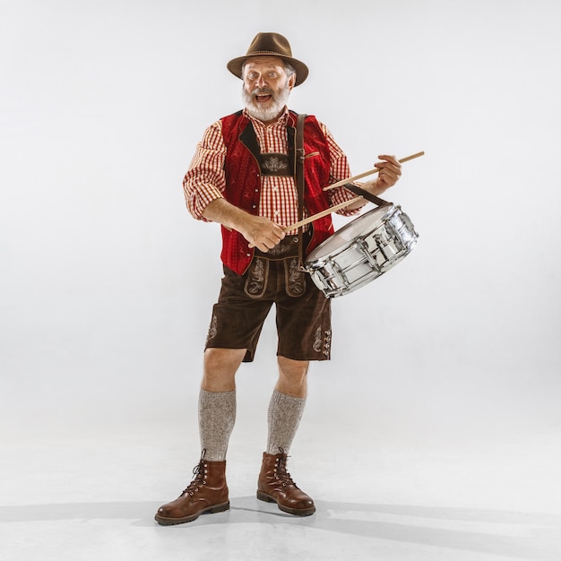 Portrait of Oktoberfest man, wearing the traditional Bavarian clothes