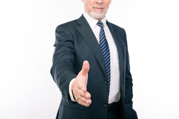 Portrait of old businessman in suit