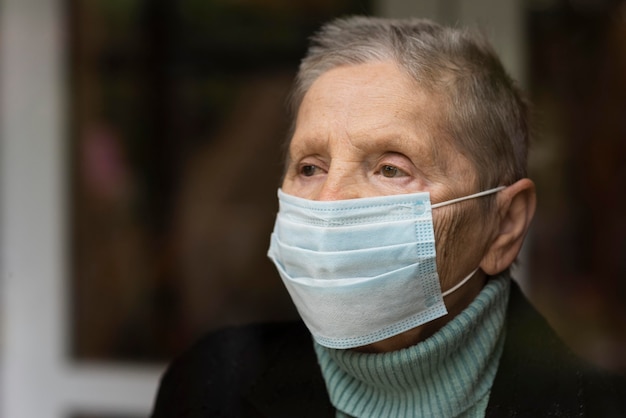 Portrait old elder woman with medical mask