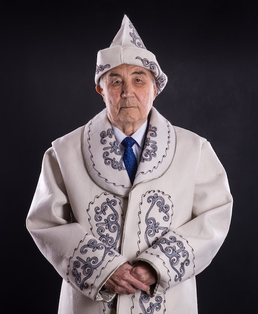 portrait of an old kazakh in national kazakh clothes