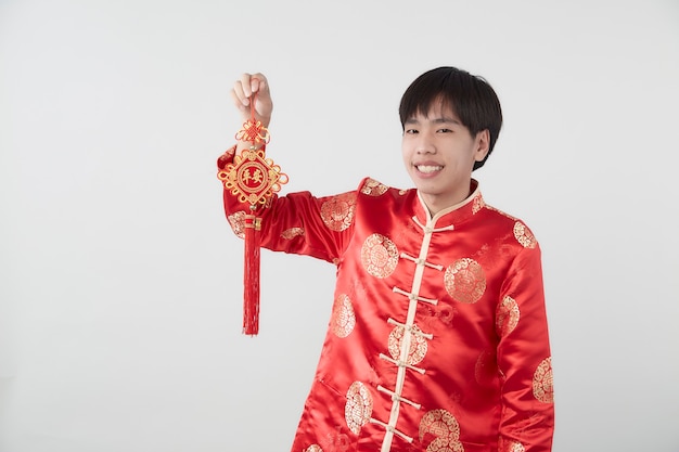 Portrait of Oriental young man with traditional clothing 