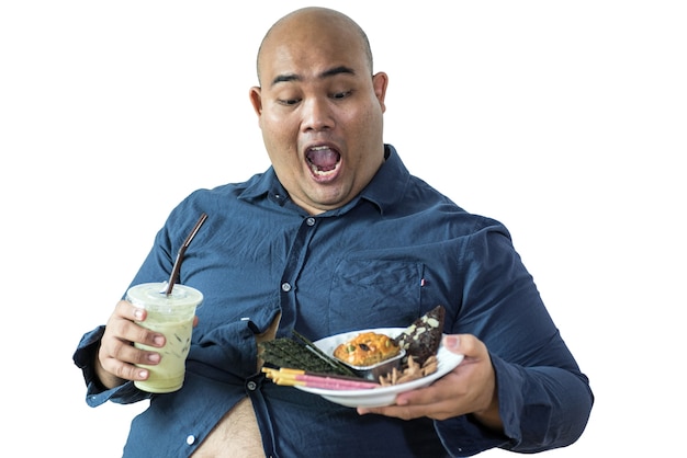 portrait of overweight person feels hungry and eating chips