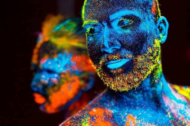 Portrait of a pair of lovers painted in fluorescent powder