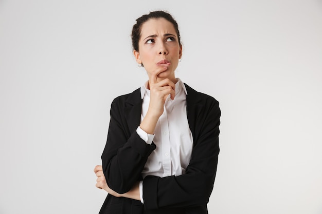 Portrait of a pensive young businesswoman