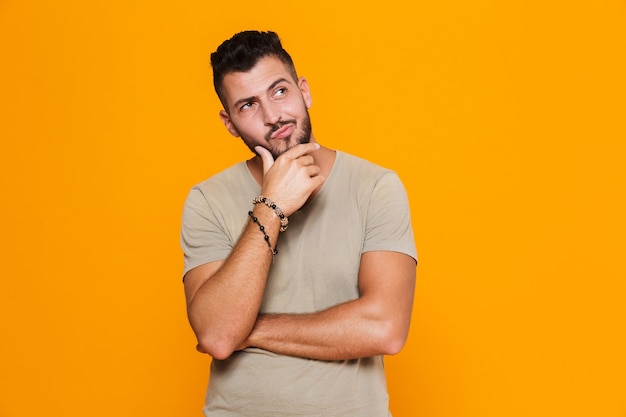 Portrait of a pensive young casual man