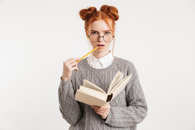 Portrait of a pensive young school nerd woman