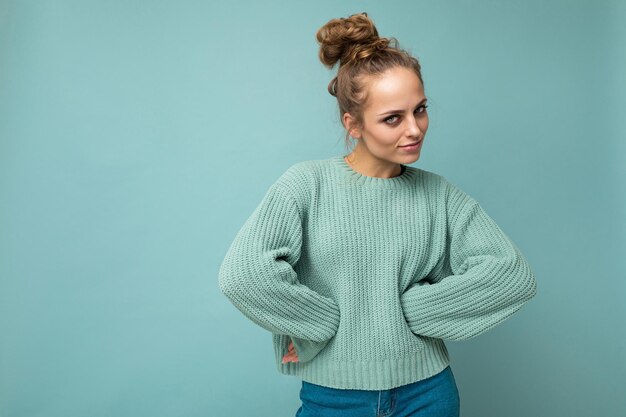 Portrait photo of young nice attractive pretty positive asking blond woman with sincere emotions