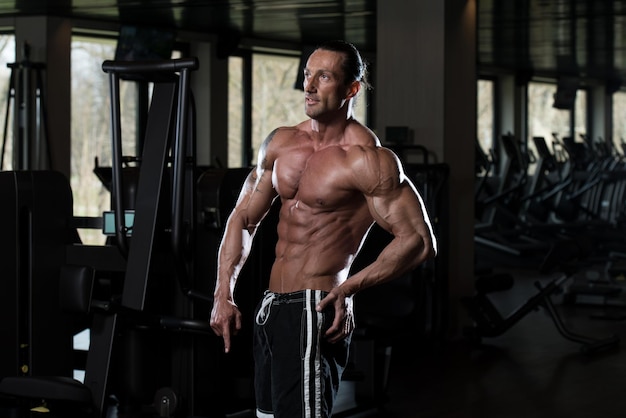 Portrait Of A Physically Fit Man In Modern Fitness Center