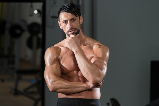 Portrait Of A Physically Fit Young Man In A Gym