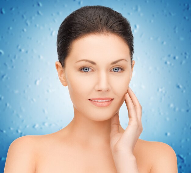 portrait picture of beautiful woman with water drops