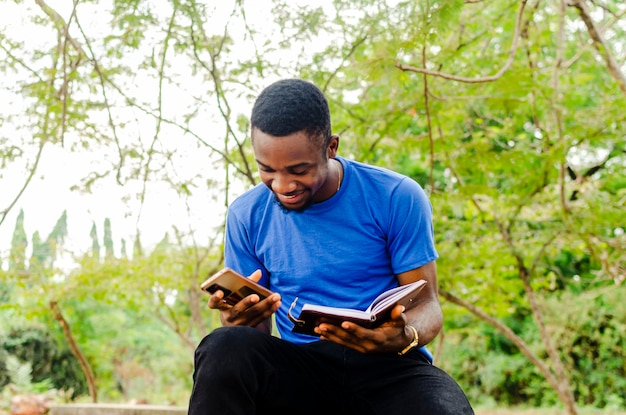 Portrait picture of a young excited male student.