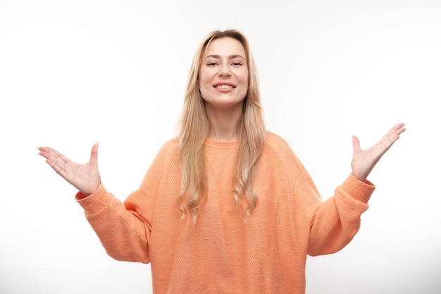 Portrait positive blonde girl emotionally rejoices and feels happy satisfied isolated on white background advertising banner