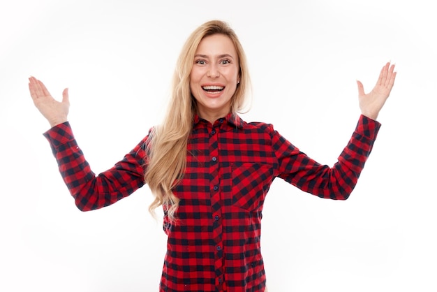 Portrait positive blonde girl emotionally rejoices and feels happy satisfied isolated on white background advertising banner