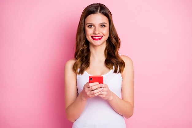 Portrait of positive cheerful girl use cellphone toothy smile