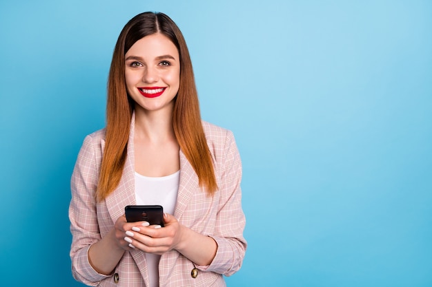 Portrait of positive cheerful use smartphone enjoy social network