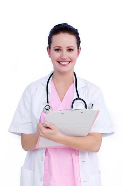 Portrait a positive female doctor writing notes 