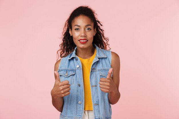 Portrait of a pretty african woman dressed in denim vest