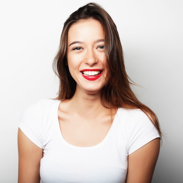 Photo portrait of a pretty girl  on a white background