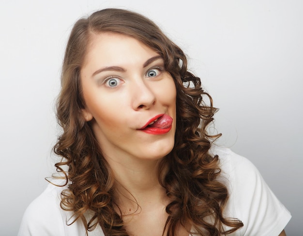 Portrait of a pretty girl on a white background