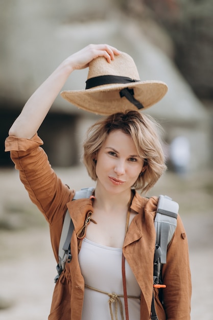 Portrait of pretty girl with short hair posing to the camera