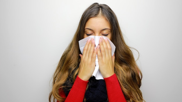 Portrait of a pretty woman having flu