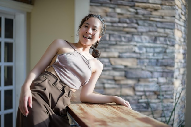 PORTRAIT Pretty woman in a restaurant cafe with feeling happy