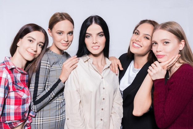 A portrait of pretty women on grey background