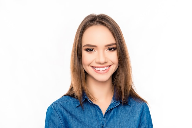 Portrait of pretty young brunette woman with beaming smile