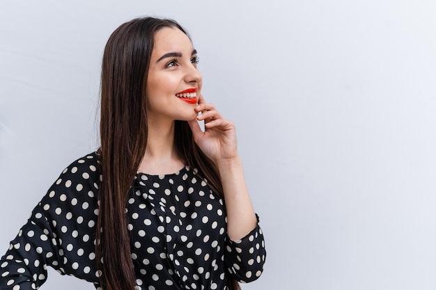 Portrait of pretty young smilling woman Elegant cheerful female model