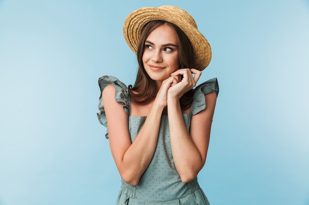 Portrait of a pretty young woman in dress