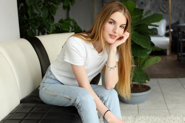 Portrait of pretty young woman girl at home