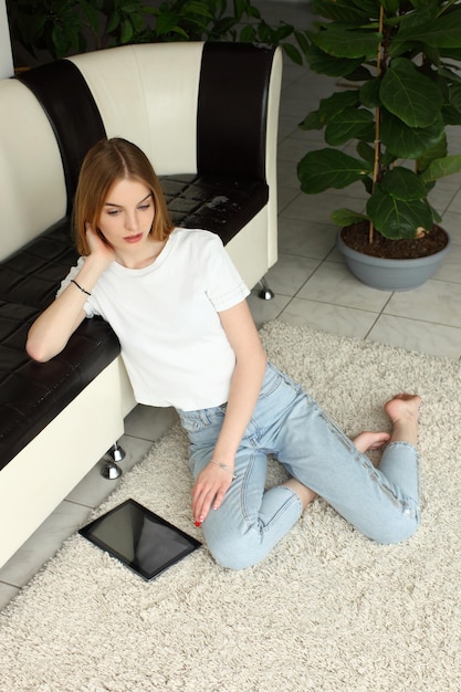 Portrait of pretty young woman girl at home