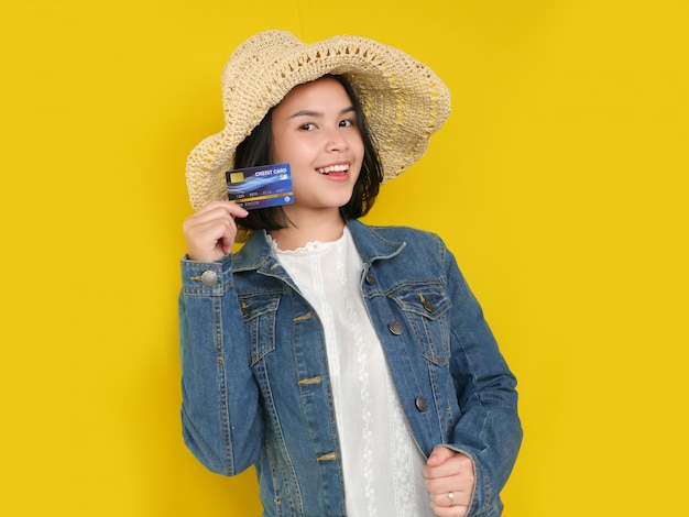 Portrait of pretty young women is shopping online and paying by credit card