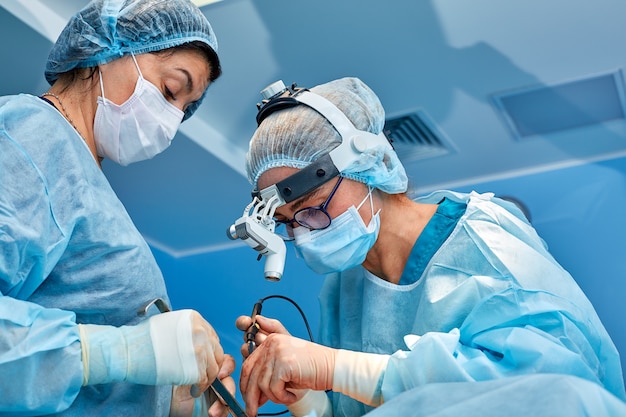 Portrait of professional surgeons during surgery