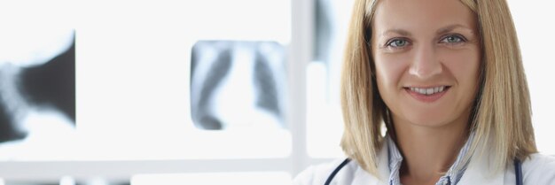 Portrait of qualified medical worker posing on camera professional doctor in uniform in