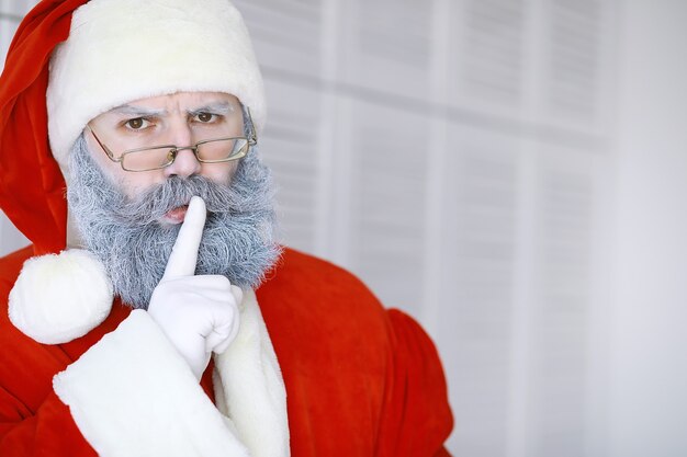 Portrait of real happy Santa Claus.Funny Santa. Theme Christmas holidays and winter new year Christmas are coming!