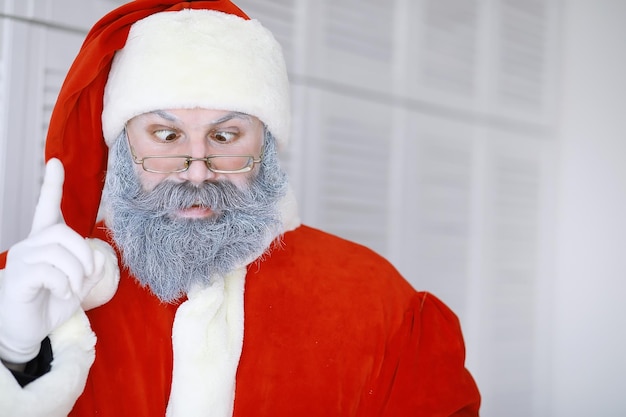 Portrait of real happy Santa ClausFunny Santa Theme Christmas holidays and winter new year Christmas are coming