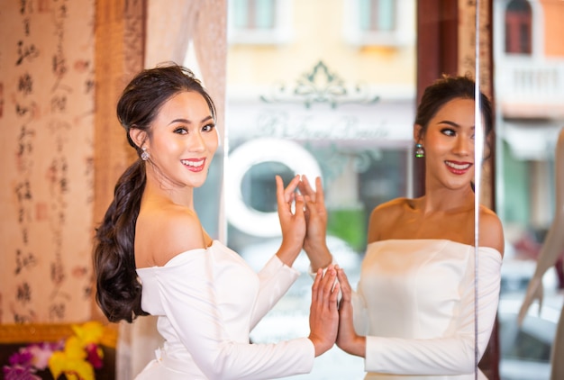 Portrait of real women with fashion hairstyle white cloth standing on street, Young millennial hipster stylish diverse women, real women, empowerment women for women's day concept