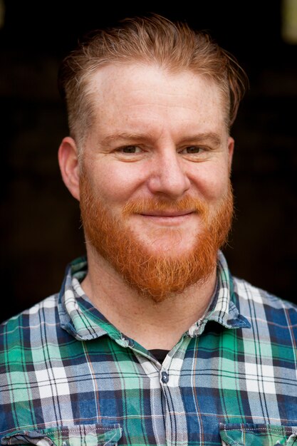 Portrait of red haired man with long beard