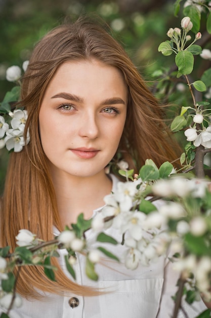 Portrait of a redhaired beauty in the spring nature 2953