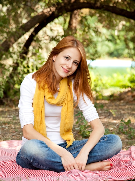 Portrait redhead girl at outdoor. Autumn.