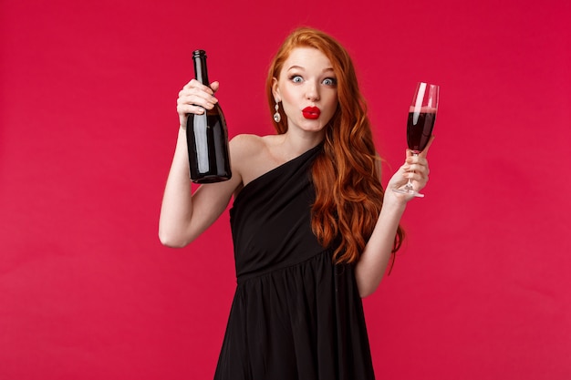 Portrait of a redhead woman in black dress