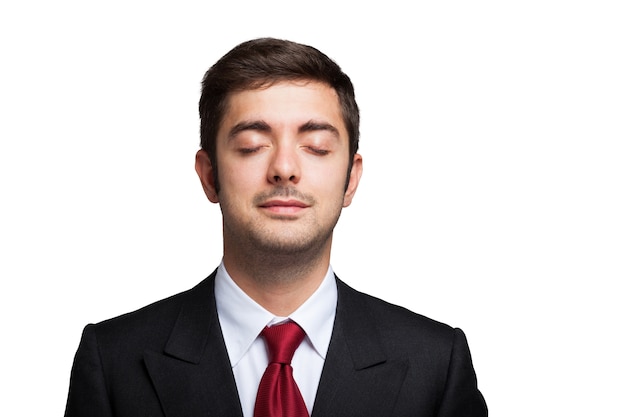 Portrait of a relaxed businessman. Isolated on white background