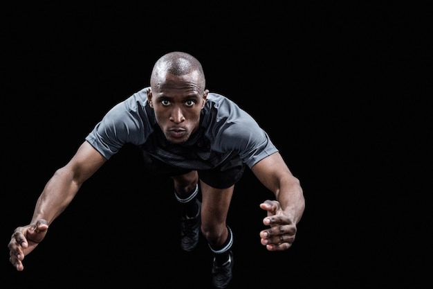 Portrait of rugby player jumping