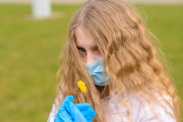 Portrait of sad caucasian child in face mask