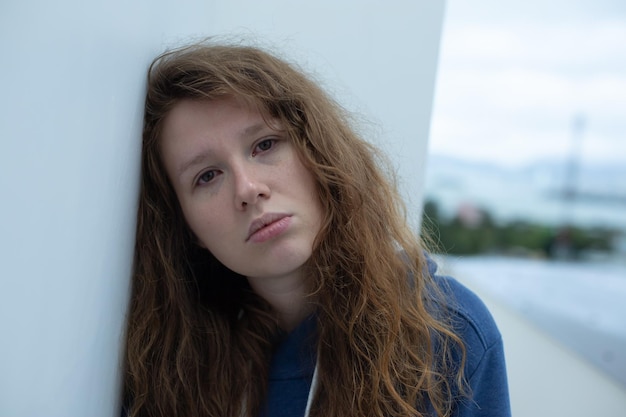 Photo portrait of sad depressed upset young desperate woman crying girl with red tearful eyes with tears